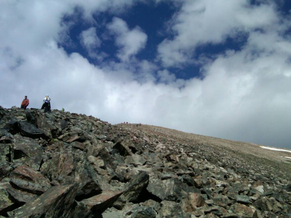 The rocky upper ridge below the summit