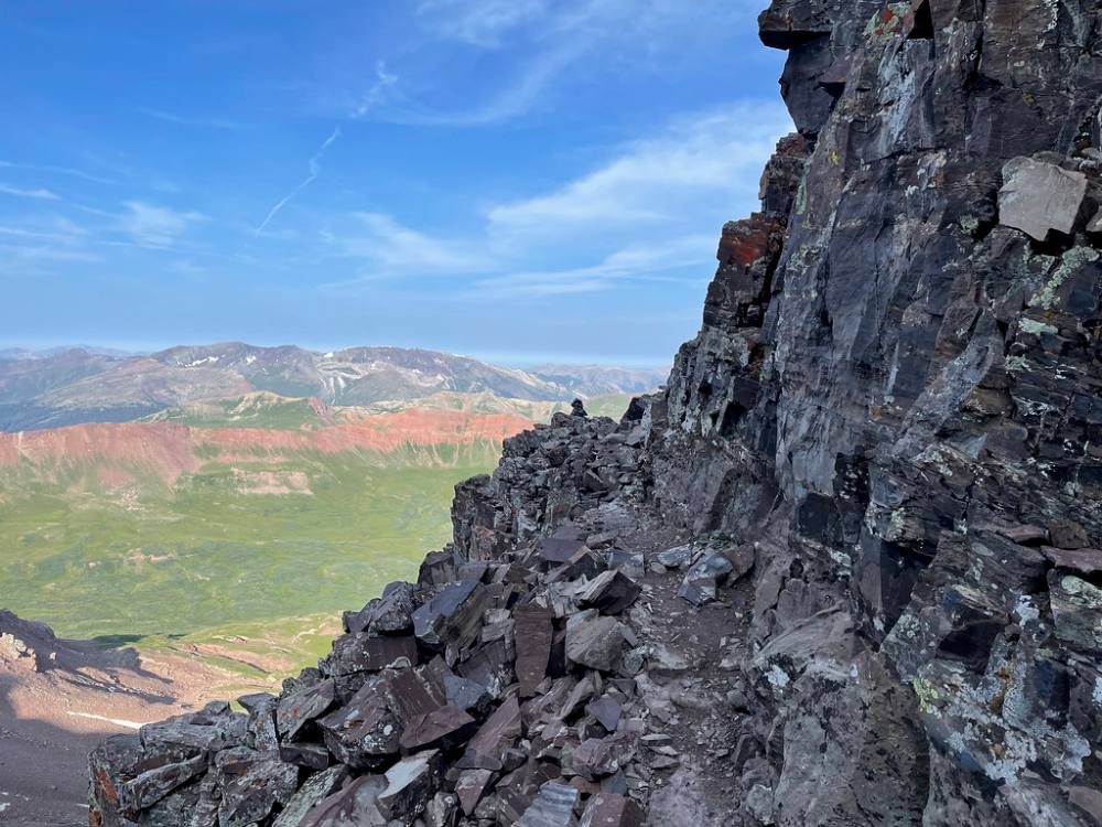 Loose ledges high on the south ridge
