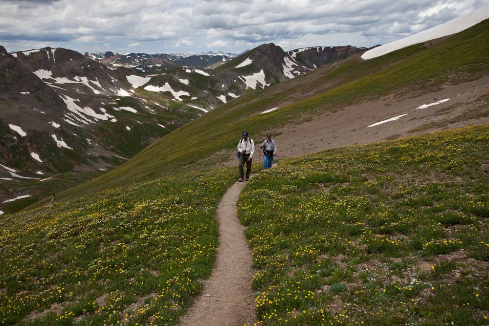 The trail climbing toward the saddle